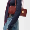 Amazona 31 Cropped-tas van glanzend kalfsleer Amazona 31 Cropped-tas van glanzend kalfsleer
