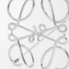 Anagram-broche van metaal Anagram-broche van metaal