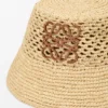 Anagram-buckethoed van raffia en kalfsleer Anagram-buckethoed van raffia en kalfsleer