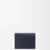 Anagram-portemonnee met drie vouwen van kalfsleer met Pebble-structuur Anagram-portemonnee met drie vouwen van kalfsleer met Pebble-structuur