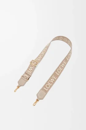 Anagram-riem van jacquard en kalfsleer Anagram-riem van jacquard en kalfsleer