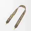 Anagram-riem van jacquard en kalfsleer Anagram-riem van jacquard en kalfsleer
