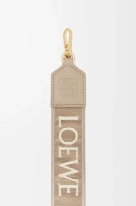 Anagram-riem van jacquard en kalfsleer Anagram-riem van jacquard en kalfsleer