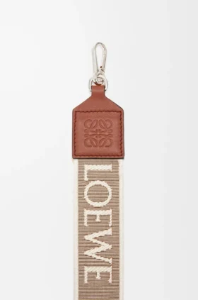 Anagram-riem van jacquard en kalfsleer Anagram-riem van jacquard en kalfsleer
