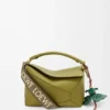 Anagram-riem van jacquard en kalfsleer Anagram-riem van jacquard en kalfsleer