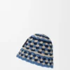 Buckethoed met patch van gehaakt raffia en kalfsleer Buckethoed met patch van gehaakt raffia en kalfsleer