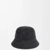 Buckethoed van raffia en kalfsleer Buckethoed van raffia en kalfsleer