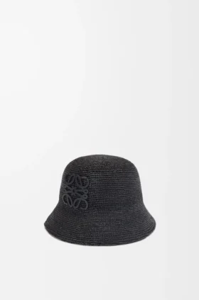 Buckethoed van raffia en kalfsleer