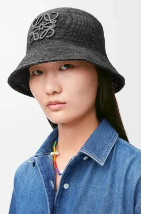 Buckethoed van raffia en kalfsleer