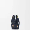 Cats medium Flamenco-clutch van geborduurd denim Cats medium Flamenco-clutch van geborduurd denim