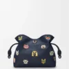 Cats medium Flamenco-clutch van geborduurd denim Cats medium Flamenco-clutch van geborduurd denim