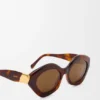 Coil-zonnebril in cat-eye-stijl Coil-zonnebril in cat-eye-stijl