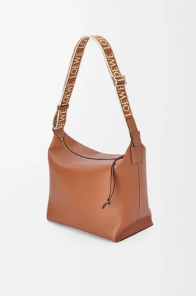 Cubi-crossbodytas van soepel, glad kalfsleer en jacquard