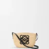 Eclipse-pochette van raffia en kalfsleer