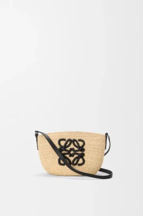 Eclipse-pochette van raffia en kalfsleer