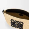 Eclipse-pochette van raffia en kalfsleer