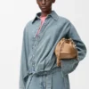 Gedrapeerd overhemd van denim Gedrapeerd overhemd van denim