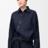 Gedrapeerd overhemd van denim Gedrapeerd overhemd van denim