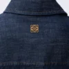 Gedrapeerd overhemd van denim Gedrapeerd overhemd van denim