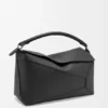 Grote Puzzle Edge-tas van generfd kalfsleer Grote Puzzle Edge-tas van generfd kalfsleer