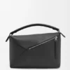 Grote Puzzle Edge-tas van generfd kalfsleer Grote Puzzle Edge-tas van generfd kalfsleer