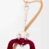 Hanger ‘Zittende Acrobaat’ van sterlingzilver en kristallen Hanger ‘Zittende Acrobaat’ van sterlingzilver en kristallen