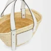 Kleine mandtas van palmblad en kalfsleer