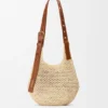Kleine Punch Hole Hobo van raffia en kalfsleer Kleine Punch Hole Hobo van raffia en kalfsleer