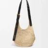 Kleine Punch Hole Hobo van raffia en kalfsleer Kleine Punch Hole Hobo van raffia en kalfsleer