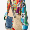 Kleine Punch Hole Hobo van raffia en kalfsleer Kleine Punch Hole Hobo van raffia en kalfsleer