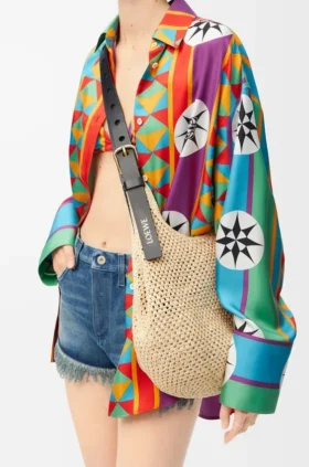 Kleine Punch Hole Hobo van raffia en kalfsleer