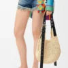 Kleine Punch Hole Hobo van raffia en kalfsleer Kleine Punch Hole Hobo van raffia en kalfsleer