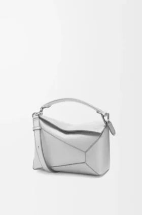 Kleine Puzzle Edge-tas van gelamineerd lamsleer Kleine Puzzle Edge-tas van gelamineerd lamsleer
