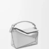 Kleine Puzzle Edge-tas van gelamineerd lamsleer Kleine Puzzle Edge-tas van gelamineerd lamsleer