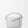 Kleine Puzzle Edge-tas van gelamineerd lamsleer Kleine Puzzle Edge-tas van gelamineerd lamsleer