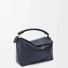 Kleine Puzzle Edge-tas van zacht generfd kalfsleer Kleine Puzzle Edge-tas van zacht generfd kalfsleer