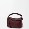 Kleine Puzzle-tas van glad kalfsleer en nappa-lamsleer Kleine Puzzle-tas van glad kalfsleer en nappa-lamsleer