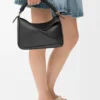Kleine Puzzle-tas van glad kalfsleer en nappa-lamsleer Kleine Puzzle-tas van glad kalfsleer en nappa-lamsleer