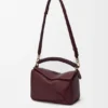 Kleine Puzzle-tas van glad kalfsleer en nappa-lamsleer Kleine Puzzle-tas van glad kalfsleer en nappa-lamsleer
