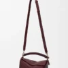 Kleine Puzzle-tas van glad kalfsleer en nappa-lamsleer Kleine Puzzle-tas van glad kalfsleer en nappa-lamsleer