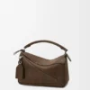 Kleine, vederlichte Puzzle-tas van genobbelde nubuck