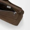 Kleine, vederlichte Puzzle-tas van genobbelde nubuck