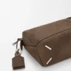 Kleine, vederlichte Puzzle-tas van genobbelde nubuck