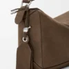 Kleine, vederlichte Puzzle-tas van genobbelde nubuck