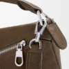 Kleine, vederlichte Puzzle-tas van genobbelde nubuck