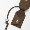 Kleine, vederlichte Puzzle-tas van genobbelde nubuck