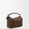 Kleine, vederlichte Puzzle-tas van genobbelde nubuck