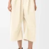 Korte broek met riemen van katoen en zijde Korte broek met riemen van katoen en zijde