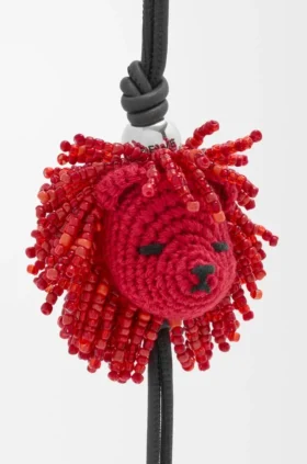 Lion Head-bedeltje van gehaakt materiaal en kalfsleer