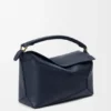 Medium Puzzle Edge-tas van zacht generfd kalfsleer Medium Puzzle Edge-tas van zacht generfd kalfsleer